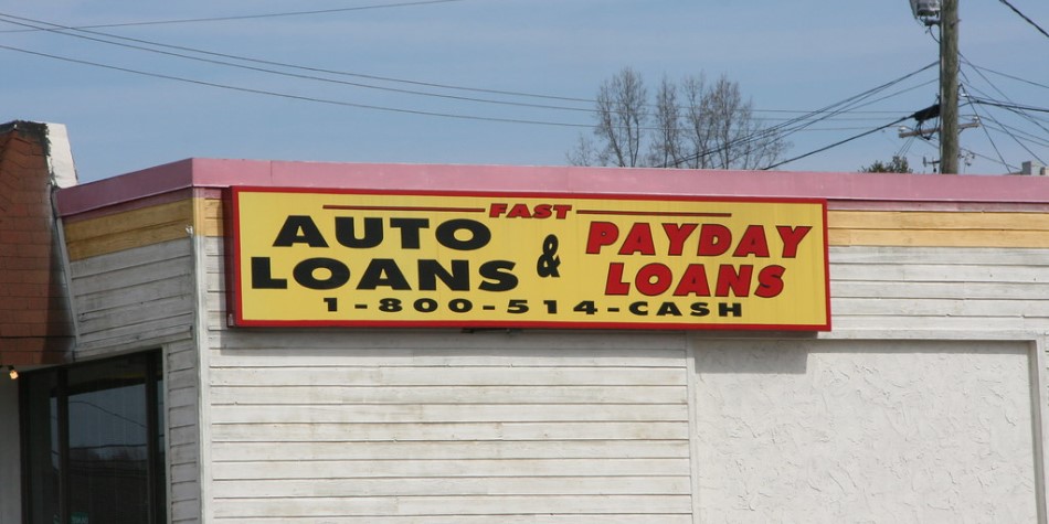 Sign advertising fast auto loans and payday loans