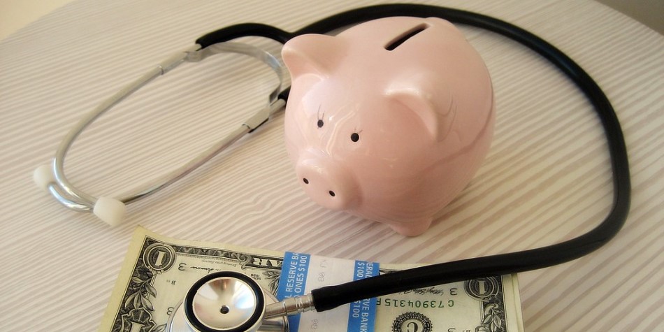 Piggy Bank Stethoscope and Dollar Bills